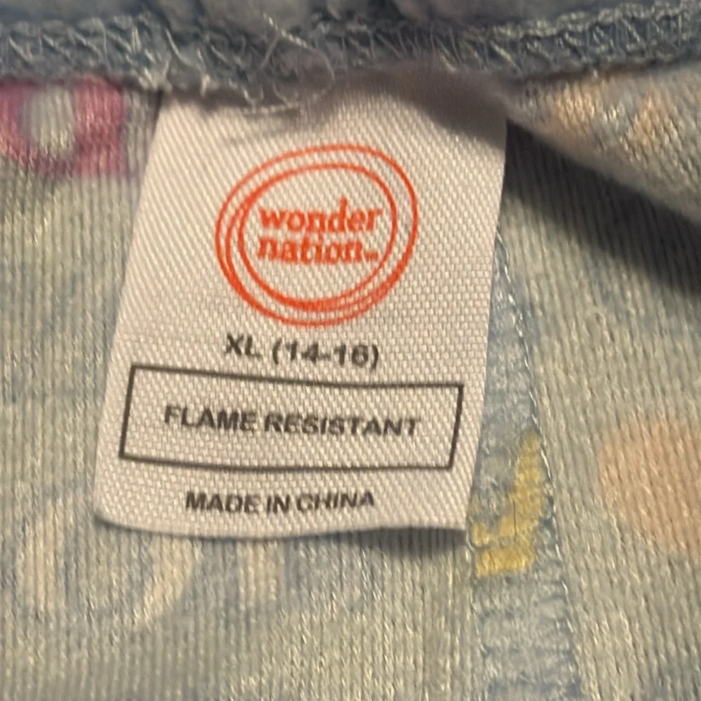 Pajama set. Two pair of pants and one set Youth XL and one adult XS